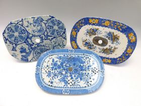 Two 19th century blue and white transfer printed drainers along with a Spode blue and yellow