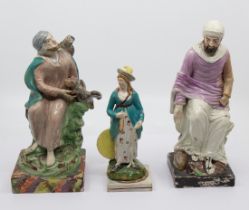 Three Staffordshire 19th century square based figures: The Lady Archer and two models of Elijah, c.