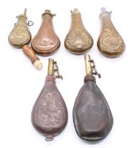 A collection of mixed late 19th or 20th century brass, leather or copper powder flasks to include;