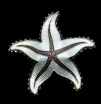 Norwegian interest: a Modernist enamel silver gilt brooch by Ivor T Holth, modelled as a Seastar,