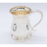 A George V silver tankard, of baluster form with stepped base, single handle to side, hallamrked