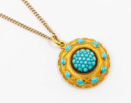 A Victorian Etruscan turquoise set gold mourning pendant, circular domed form, set to the centre
