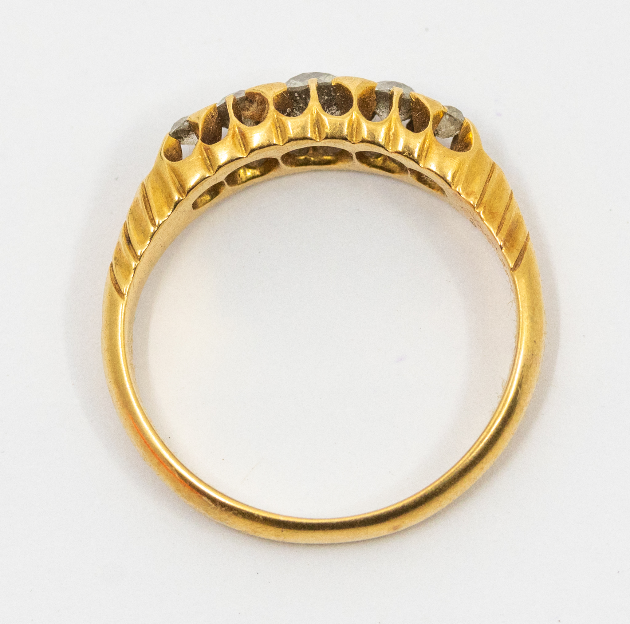 A diamond and 18ct gold boat head ring, comprising a row of graduated old cut diamonds, the centre - Image 2 of 3