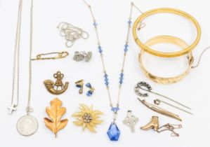 A  collection of costume jewellery to include gold plated bangles, together with silver and white