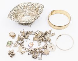 A collection of silver to include; a Victorian elaborately pierced floral decorated Birmingham