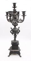 A Gothic Revival modern reproduction candelabra with five sconces and elaborate stylised form, black