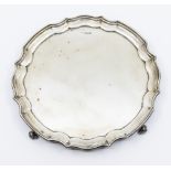 A Georgian style silver salver with pie crust rim, hallmarked Sheffield 1951, maker mark indistinct,