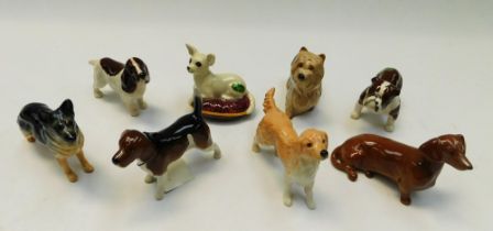 Collection of eight boxed Beswick small mix dog breeds to include Dachshund, Yorkshire Terrier,