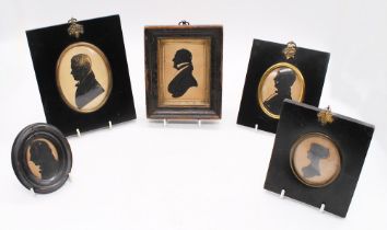 A collection of 19th century silhouettes, hand-painted and framed