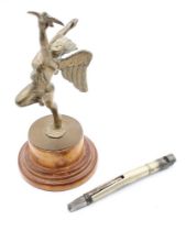 A bronze metal figure of the Angel of Peace along with an 1800s stationmaster's carriage key and