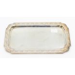 A 20th century WMF silver plated tray with stamped marks to edge, with banner and beaded edged
