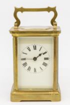 Early to mid 20th century French brass carriage clock, with glazed bevel glass panels and roman