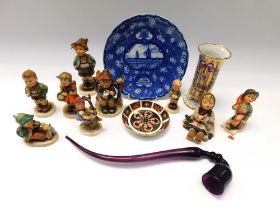 A collection of German Hummell, Goebel figures (some damaged) along with a Royal Crown Derby Imari