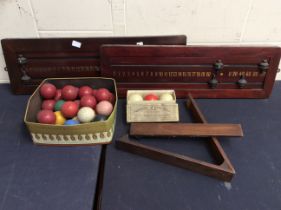 Collection of vintage snooker balls, score boards and triangle.