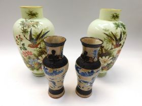 Pair of Victorian Vaseline glass vases with bird and flower hand painted detail. Also a pair of