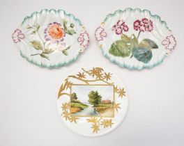 Pair of early 19th century hand painted leaf shape porcelain dishes, foliage and flower detail