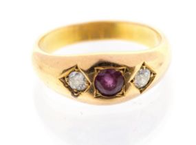 A ruby and diamond set gold ring, comprising a round cut ruby to the centre, stone approx 4mm,