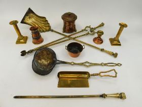 A collection of brass and copper to include: fire irons, pair of candlesticks, warming pan etc (1