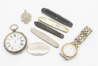 A collection of items to include a a silver brooch with millennium hallmark along with a silver