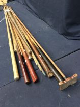 Collection of mid to late 20th century snooker cues and snooker spiders.