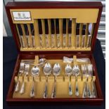 An Arthur Price silver plated six place canteen of cutlery , in fitted wooden case and outer