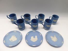 Wedgewood - A collection of 7 Jasper ware Christmas mugs and 3 Christmas plates.