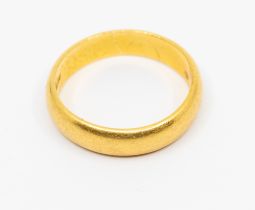 A 22ct gold heavy weight wedding band, width approx 5mm, size weight approx 6.4gms  Further details: