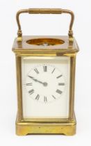 A late 19th century French brass carriage clock with Roman numerals and two barrels