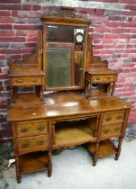 Large Victorian walnut dressing table wit corner swing mirror, pedestal shelves, two drawers