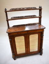 Small 19th century walnut chiffonier with mirrored glass panel doors, two shelves to back, turned