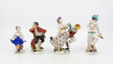 A collection of four Continental porcelain figurines