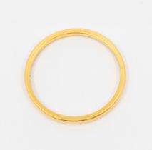 A 22ct gold narrow wedding band, width 2mm, size Q1/2, weight approx 2.4gms Further details: some