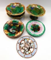 A small collection of Wedgewood and other Majolica wares to include, three tazzas, two dishes, eight