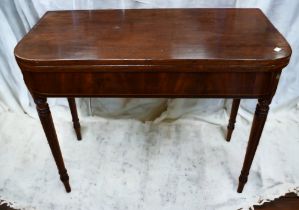 George III mahogany card table with fold over playing surface.