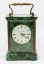 A Matthew Norman of London malachite  style enamelled cased carriage clock, with brass sides and