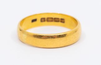 A 22ct gold 'D' shaped wedding ban, width approx 5mm, size W, weight approx 7.1gms  Further details: