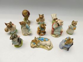 A collection of eleven boxed Royal Albert Beatrix Potter figures.