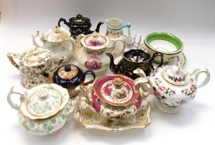 A collection of 19th century and early 20th century porcelain teapots, slop bowls, cream jugs and