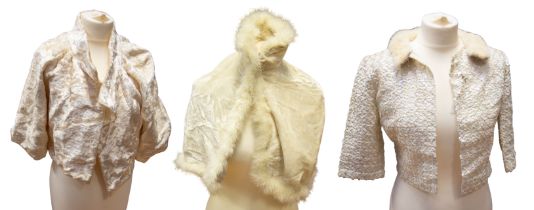 A cream velvet/faux fur jacket, mid to late 1940s. A velvet cream cape with marabou trimmed