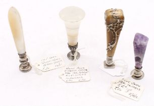 A collection of four various desk seals to include: an Edwardian silver mounted agate desk seal, the