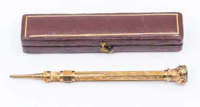 A late 19th century 9ct gold propelling seal topped pencil, comprising a hexagonal shaped barrel