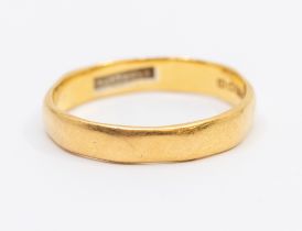 A gentleman's 22ct gold wedding band, width approx 4mm, size U, weight approx  4.7gms Further