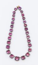 A 19th century foil closed back quartz Riviera necklace, comprising graduated cushion cut purple