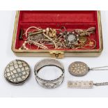 A small collection of costume jewellery to include Victorian silver cuff bangle with applied foliate