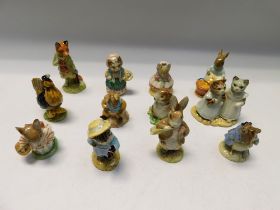 A collection of twelve Royal Albert Beatrix Potter figures, boxed.