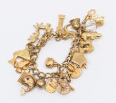 A 9ct gold charm bracelet comprising uniform links, the clasp marked 375, length approx 17cm,