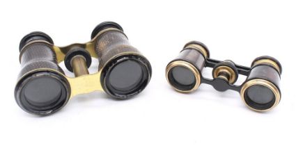 A pair of Asprey of London mother of pearl decorated metal opera glasses (slight damage to sight