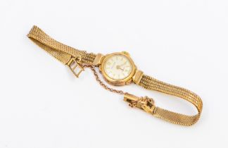 A ladies  9ct gold Nivada wristwatch, comprising a signed round silvered dial with applied baton