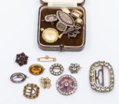 A collection of Georgian and later mourning brooches to include a Georgian marquise shaped gold