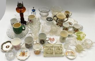 A collection of 20th century commemorative mugs, cups, plates together with a selection of glass